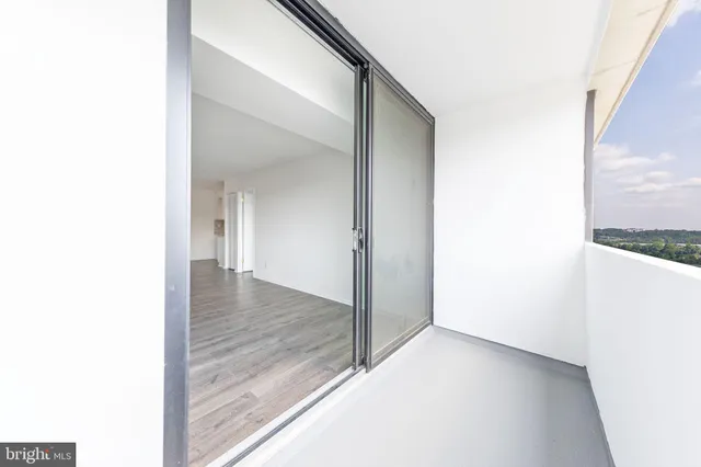 a view of a room with a hallway