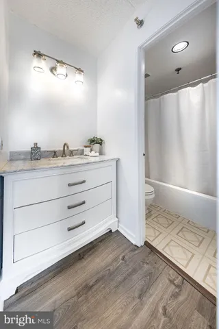 a view of a plant in a vase of a sitting area