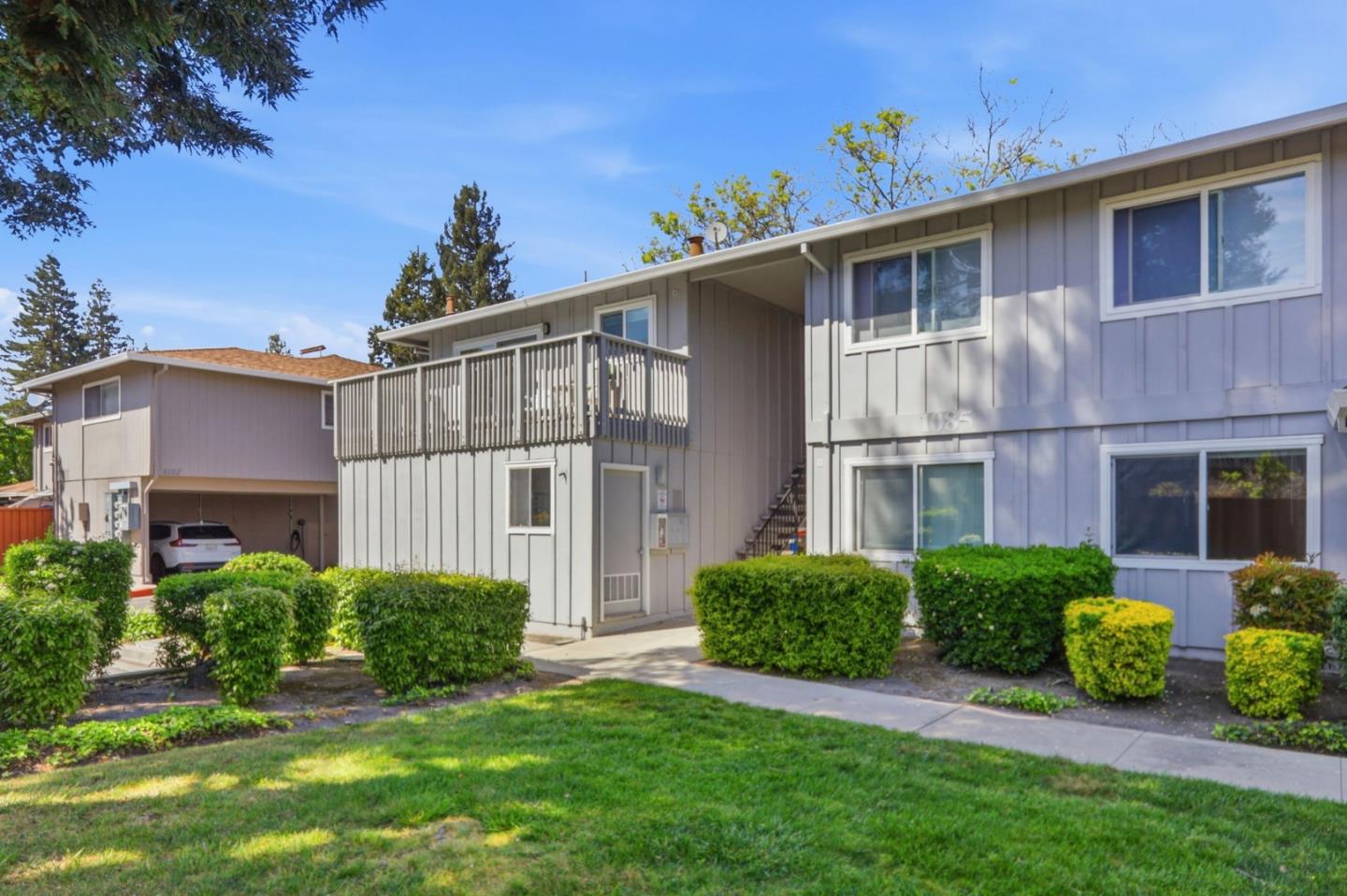 1085 Reed Avenue, Unit D Sunnyvale, CA 94086 - Photo 25 of 32 a view of front of a house with a yard