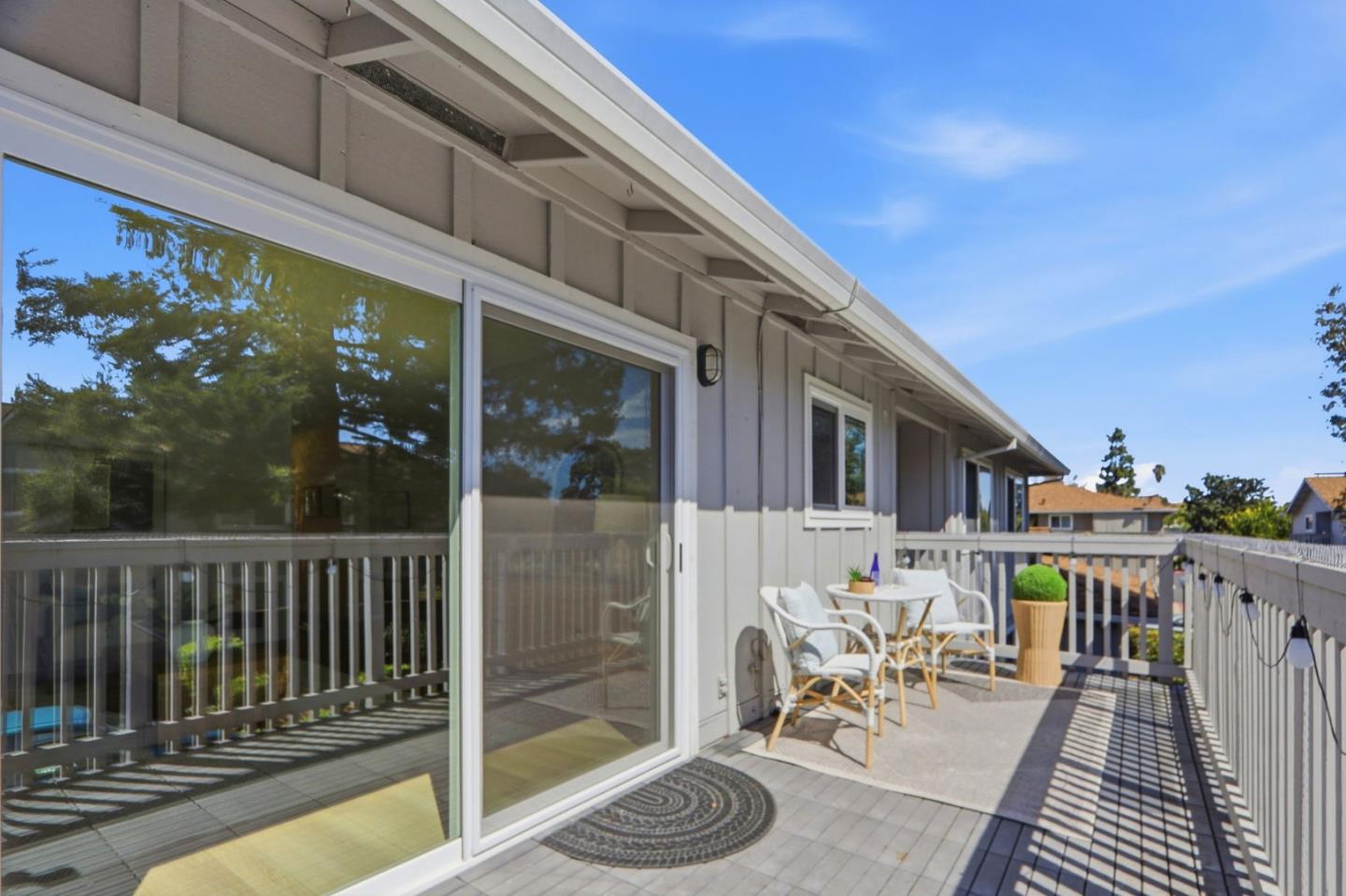 1085 Reed Avenue, Unit D Sunnyvale, CA 94086 - Photo 26 of 32 a view of a patio with a table and chairs