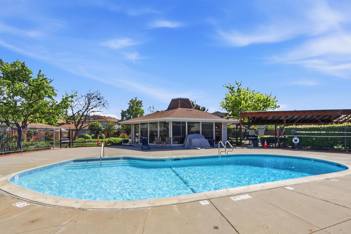 1085 Reed Avenue, Unit D Sunnyvale, CA 94086 - Photo 31 of 32 a front view of a house with a yard