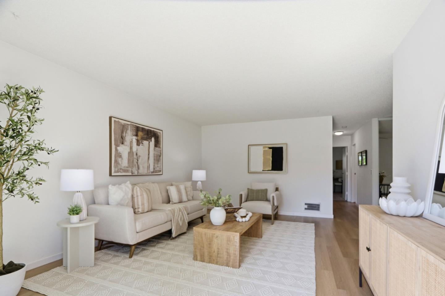 1085 Reed Avenue, Unit D Sunnyvale, CA 94086 - Photo 4 of 32 a living room with furniture and flowers