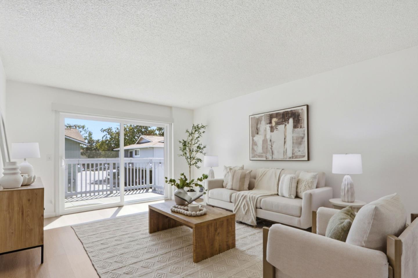 1085 Reed Avenue, Unit D Sunnyvale, CA 94086 - Photo 5 of 32 a living room with furniture and a wooden floor