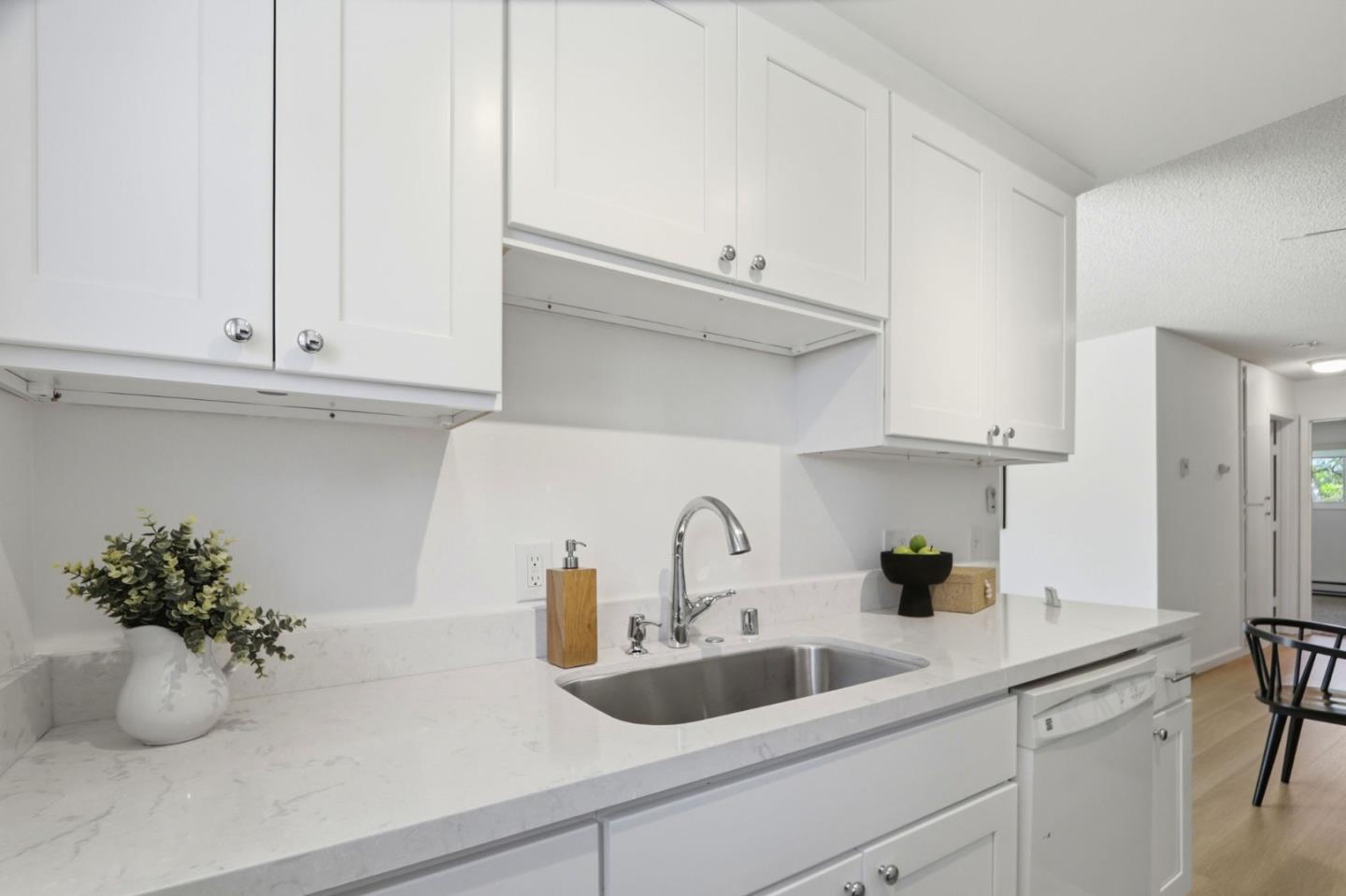 1085 Reed Avenue, Unit D Sunnyvale, CA 94086 - Photo 8 of 32 a kitchen with stainless steel appliances white cabinets and a sink