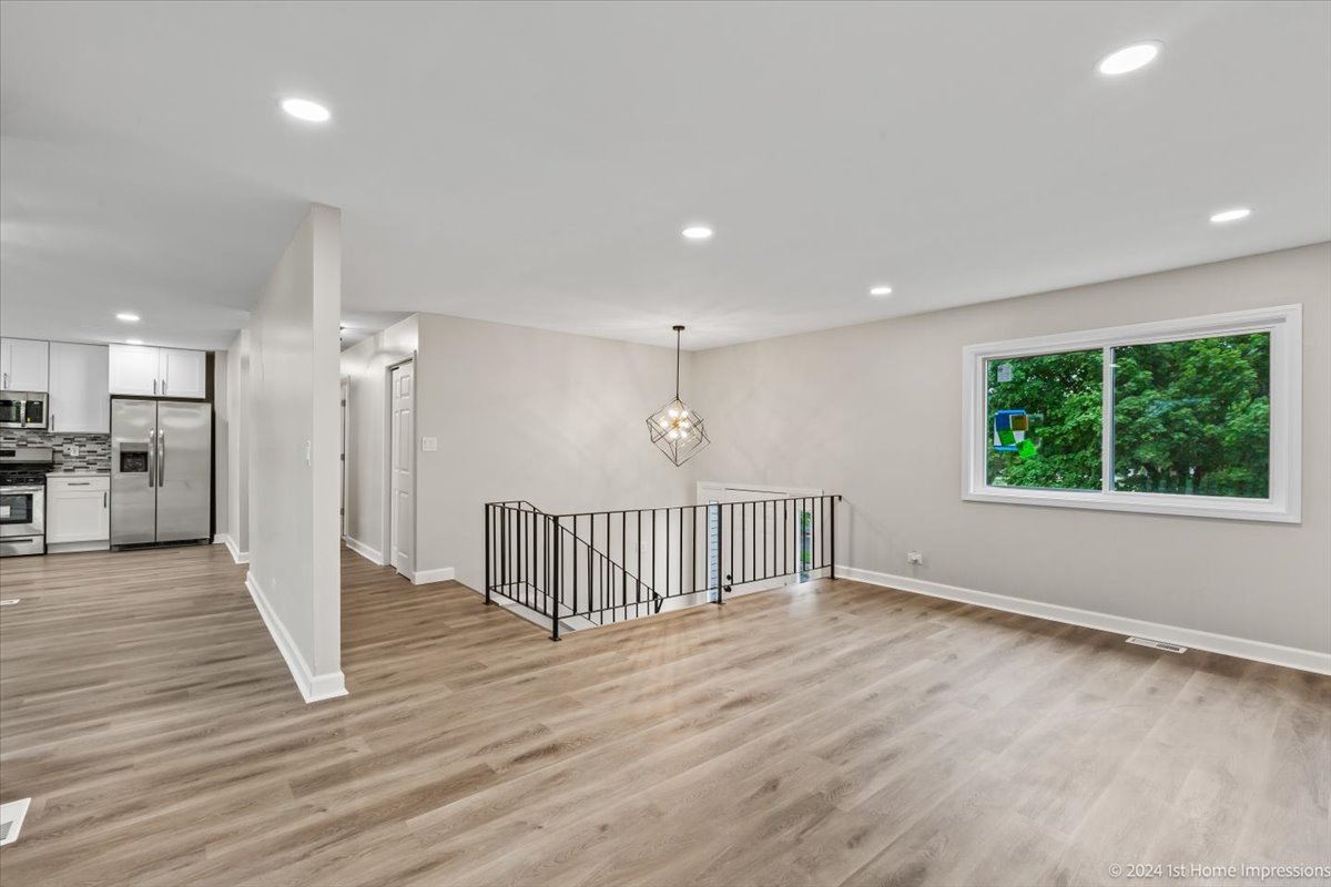 44 Wedgewood Road Matteson, IL 60443 - Photo 5 of 29 a view of a room with wooden floor and windows