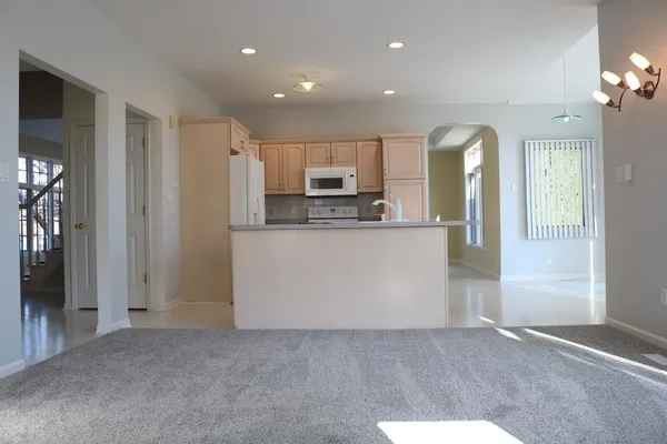 a view of a kitchen with a sink