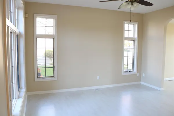an empty room that has a window