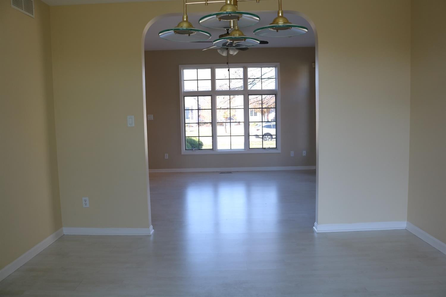 9939 Sequoia Lane Munster, IN 46321 - Photo 5 of 41 an empty room with wooden floor and windows