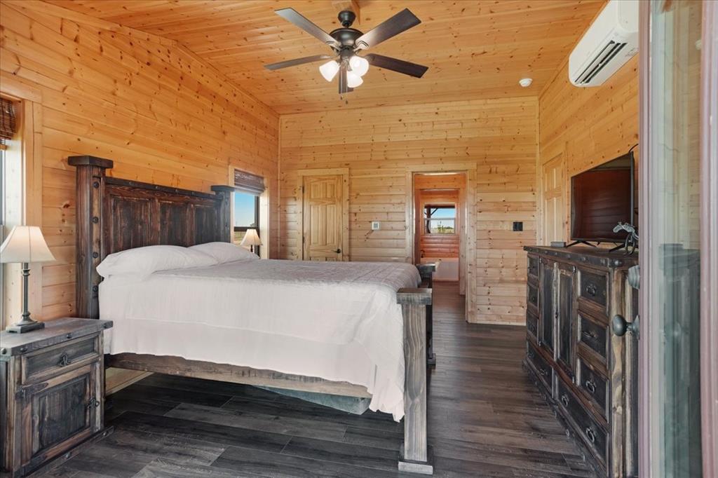 2290 Brooks Lane Sadler, TX 76264 - Photo 14 of 36 a bed room with a bed and a television