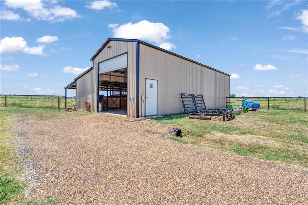 2290 Brooks Lane Sadler, TX 76264 - Photo 27 of 36 a view of a house with a yard