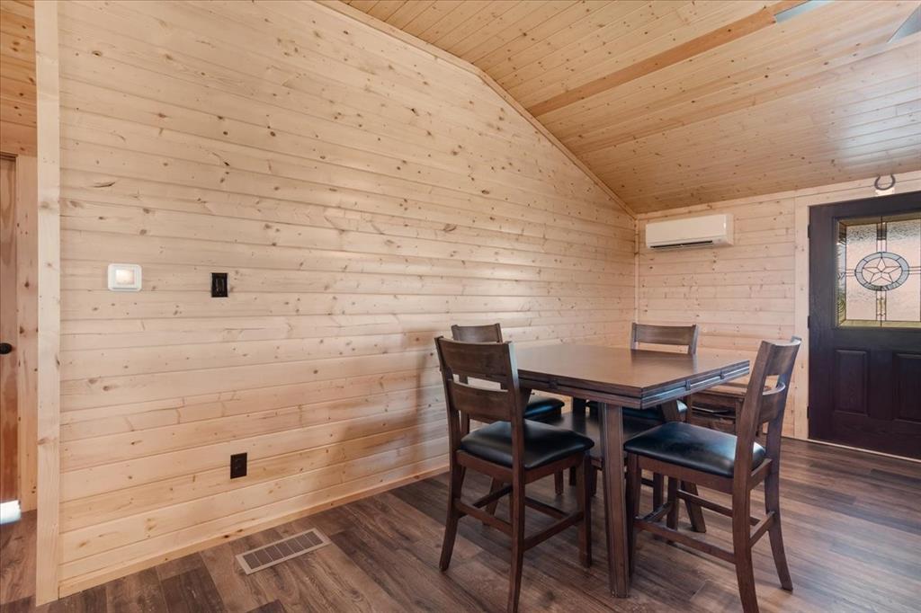 2290 Brooks Lane Sadler, TX 76264 - Photo 8 of 36 a view of a dining room with furniture and wooden floor