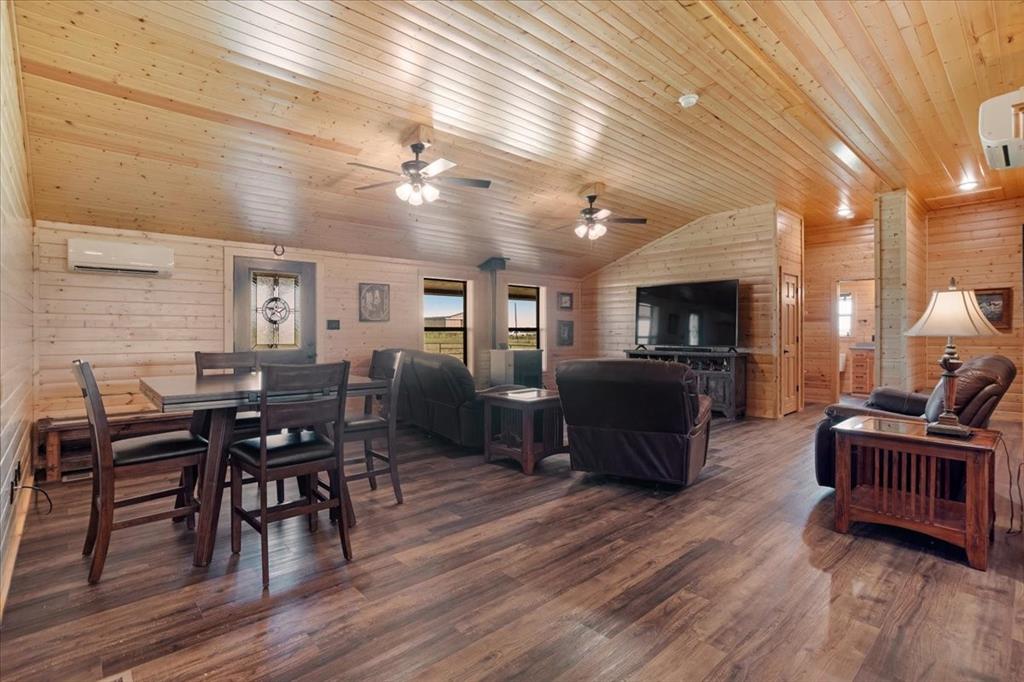 2290 Brooks Lane Sadler, TX 76264 - Photo 9 of 36 a view of a dining room with furniture and wooden floor