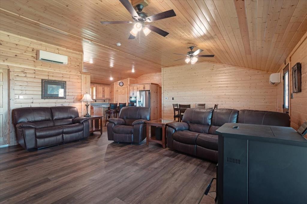 2290 Brooks Lane Sadler, TX 76264 - Photo 10 of 36 a living room with furniture a ceiling fan and a rug
