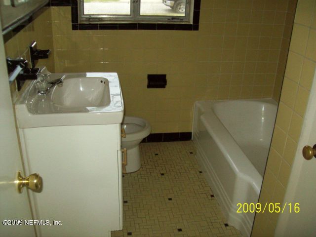1740 Furman Road Jacksonville, FL 32217 - Photo 5 of 7 a bathroom with a sink and toilet