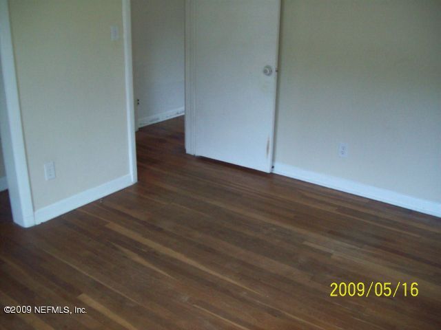 1740 Furman Road Jacksonville, FL 32217 - Photo 6 of 7 a view of a room with wooden floor