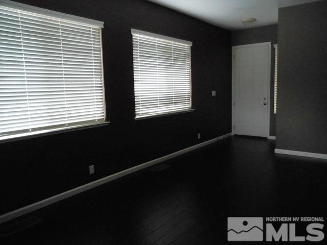 10085 Hampton Park Drive Reno, NV 89521 - Photo 3 of 20 a view of an empty room with a window