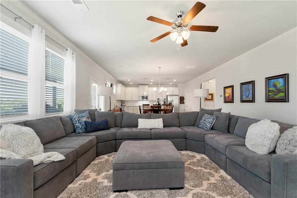253 Orchard Trail Canton, GA 30115 - Photo 11 of 40 a living room with furniture and a large window