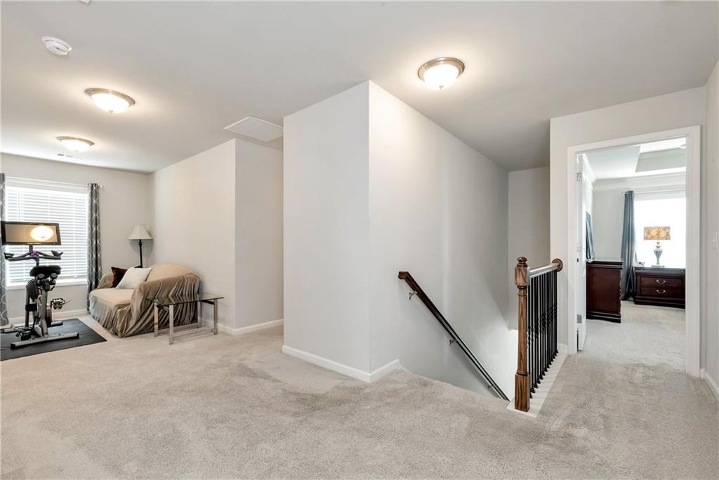 253 Orchard Trail Canton, GA 30115 - Photo 15 of 40 a bed room with furniture and a window