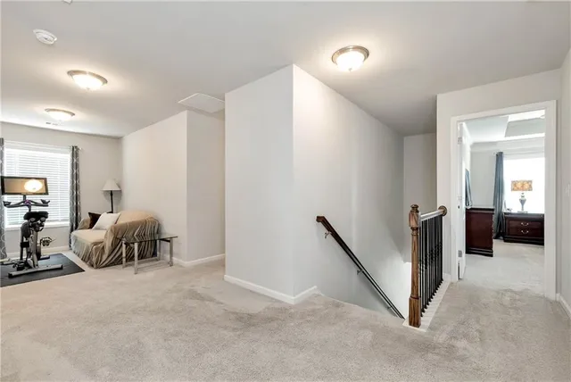 a bed room with furniture and a window