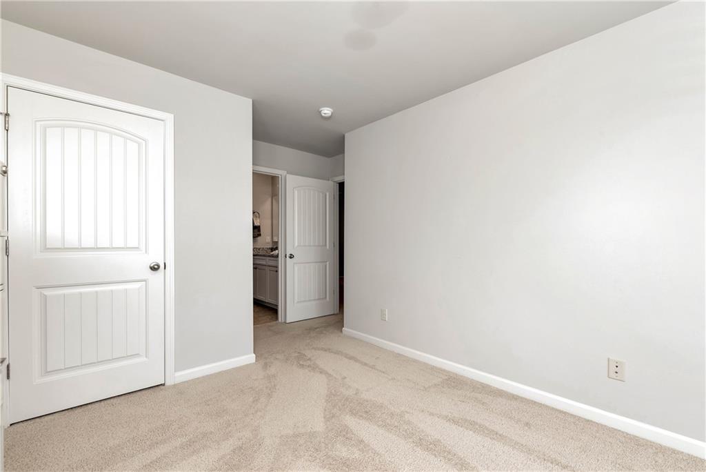 253 Orchard Trail Canton, GA 30115 - Photo 27 of 40 an empty room with a bathroom