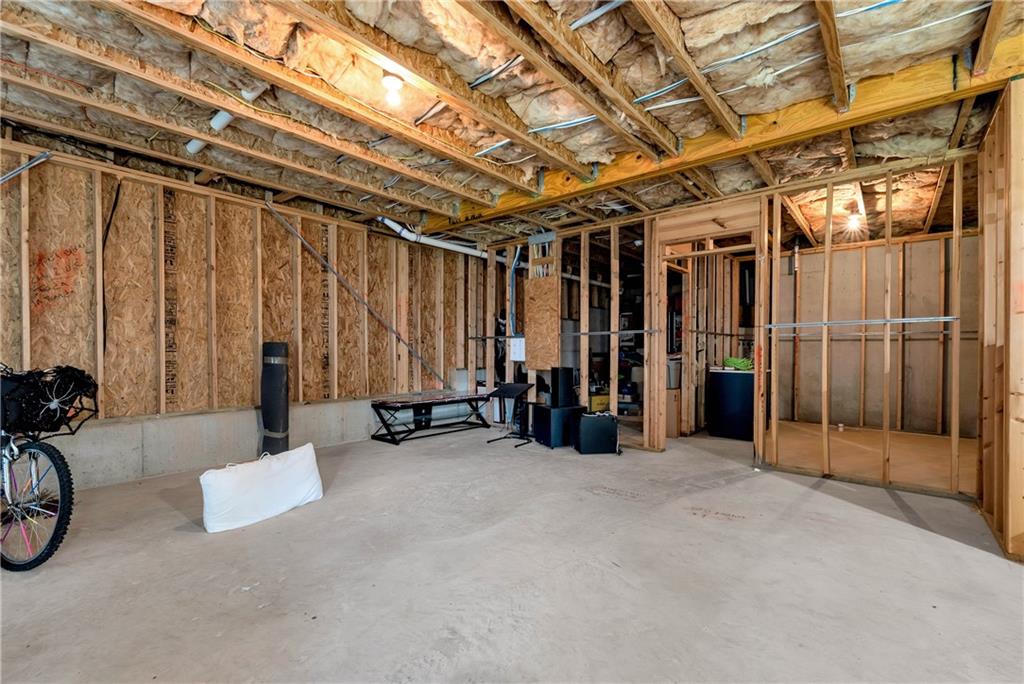 253 Orchard Trail Canton, GA 30115 - Photo 31 of 40 a view of a room with gym equipment