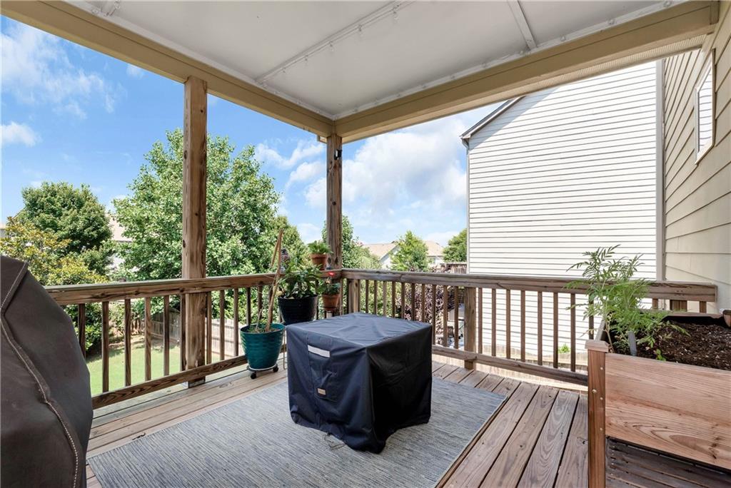 253 Orchard Trail Canton, GA 30115 - Photo 34 of 40 a view of a two chairs in the balcony