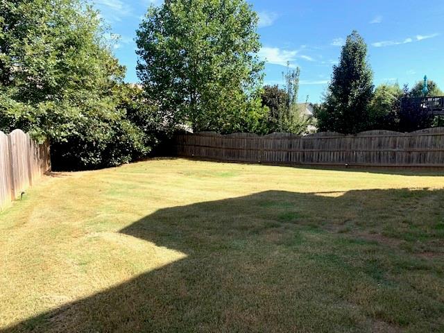 253 Orchard Trail Canton, GA 30115 - Photo 36 of 40 a view of a swimming pool with an outdoor space
