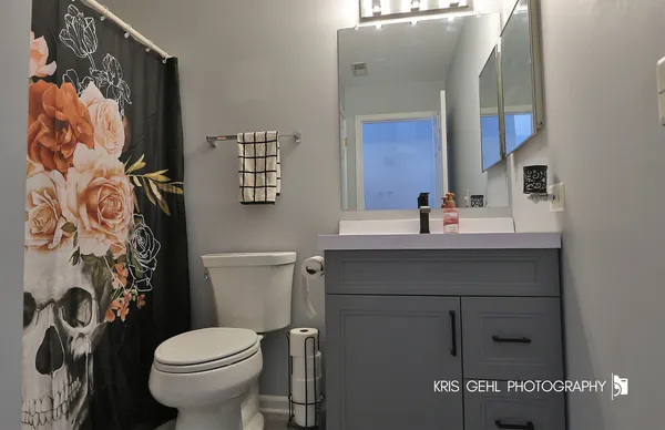 a bathroom with a sink and a toilet