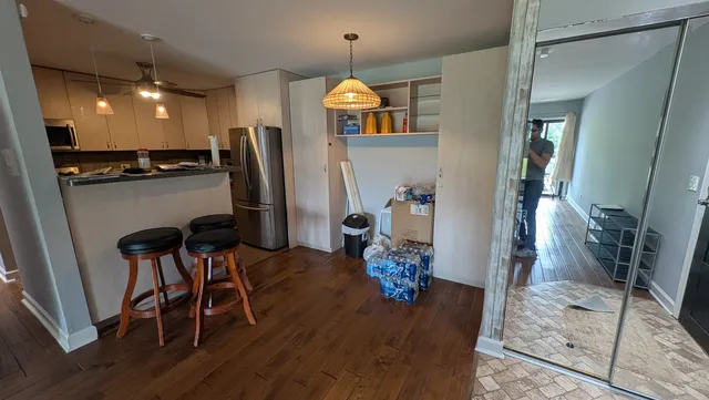 a room with furniture and a mirror