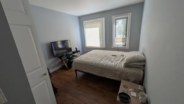 a view of entryway with wooden floor