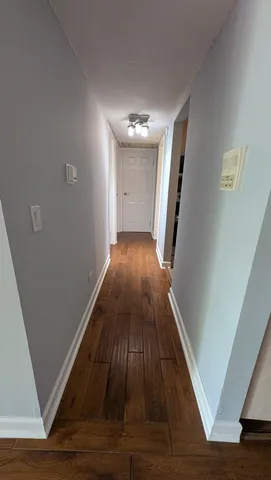 a bathroom with a bathtub and a toilet