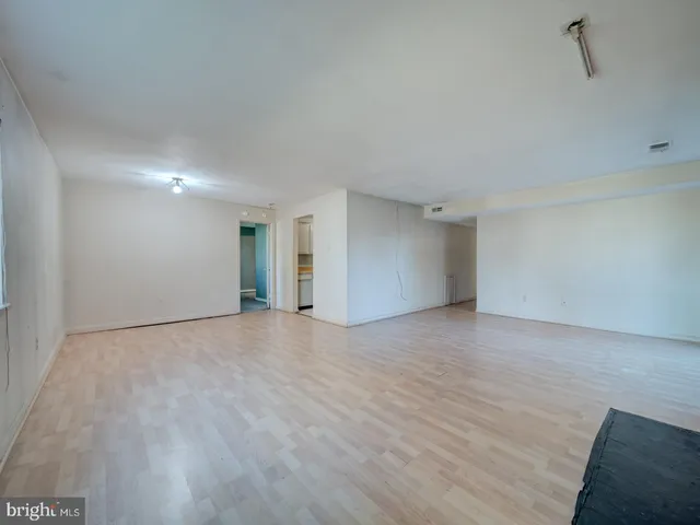 a bathroom with a toilet sink and shower