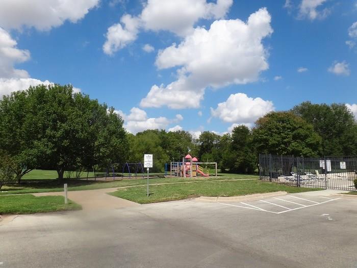 1903 Balsam Way Round Rock, TX 78665 - Photo 20 of 21 A vibrant playground and fenced pool area offer recreational amenities for residents.