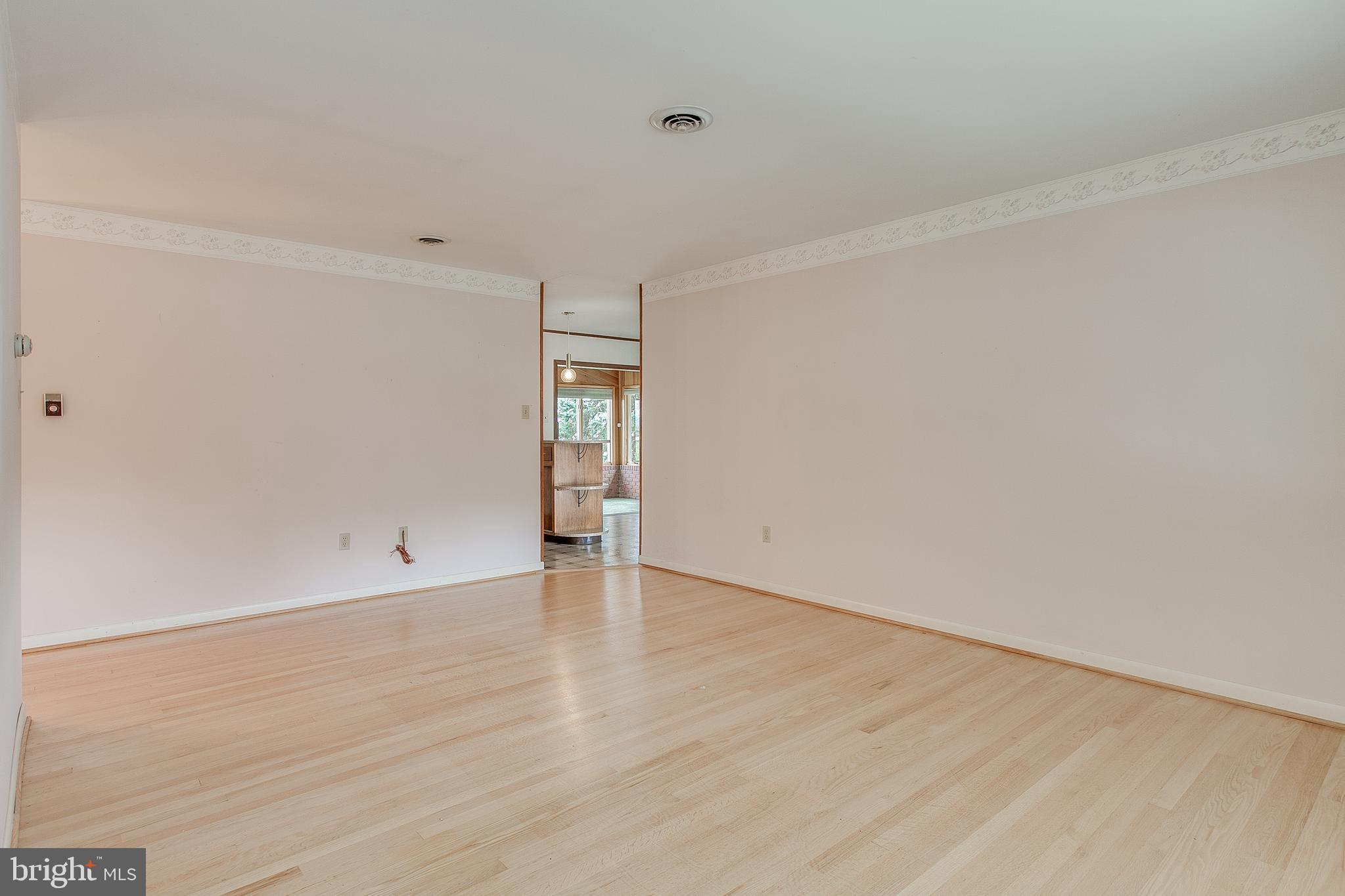 13831 Northcrest Road Hagerstown, MD 21742 - Photo 6 of 37 Living Room with HW Floors