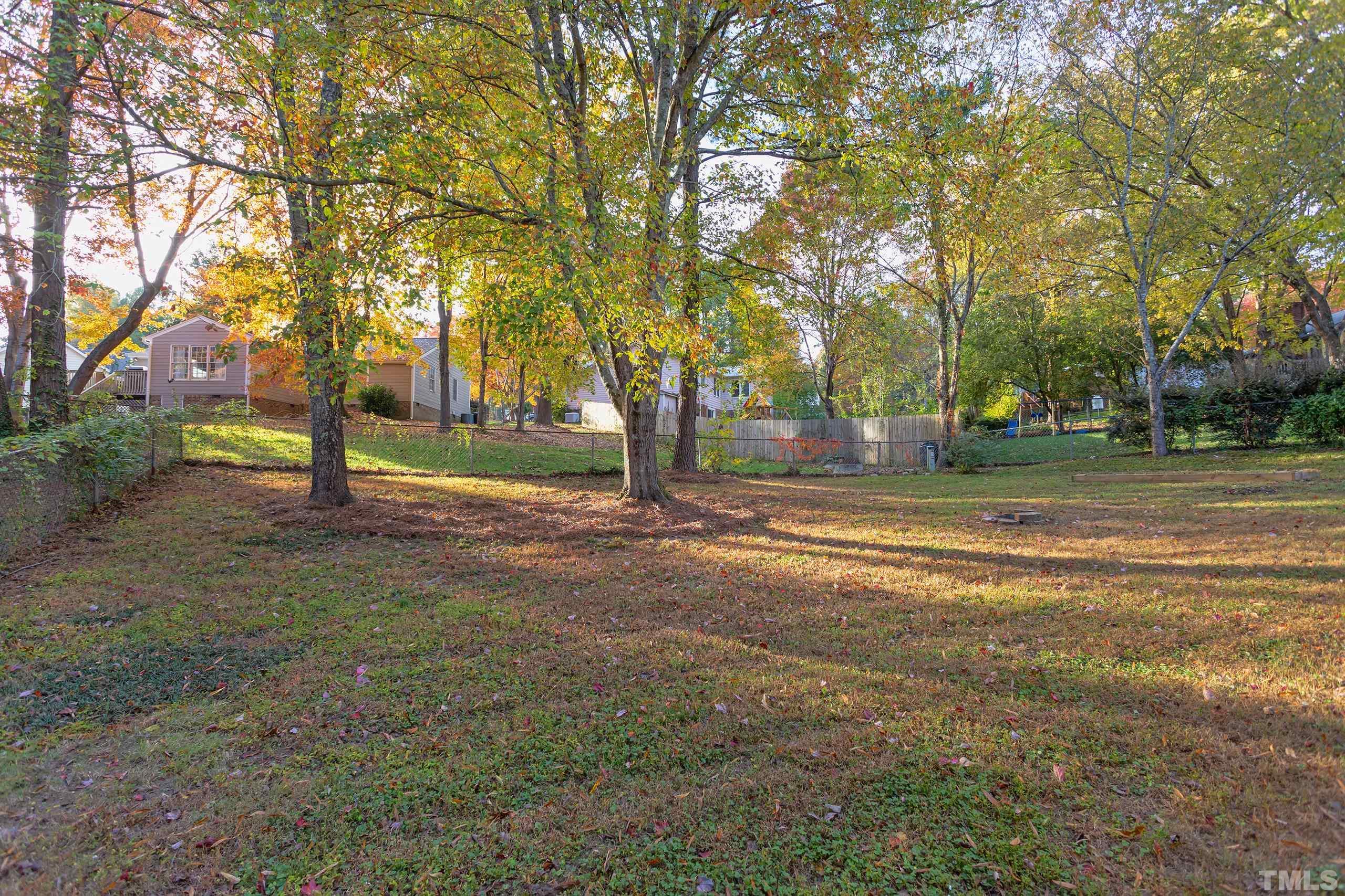6929 Three Bridges Circle Raleigh, NC 27613 - Photo 16 of 28 a view of road with trees