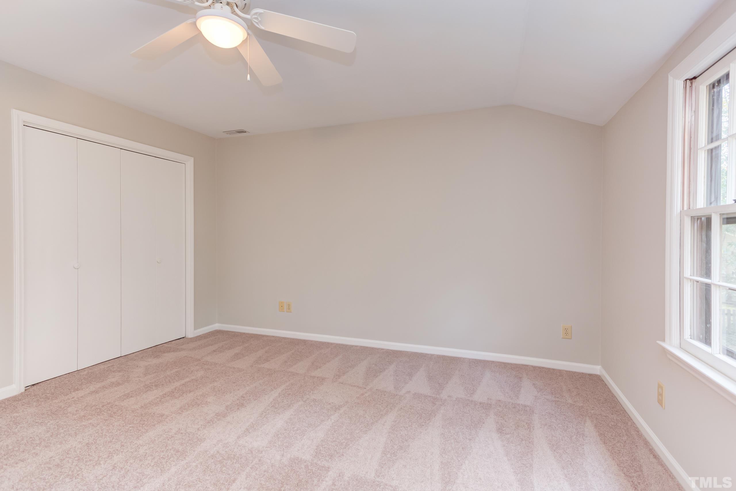 6929 Three Bridges Circle Raleigh, NC 27613 - Photo 20 of 28 an empty room with a window