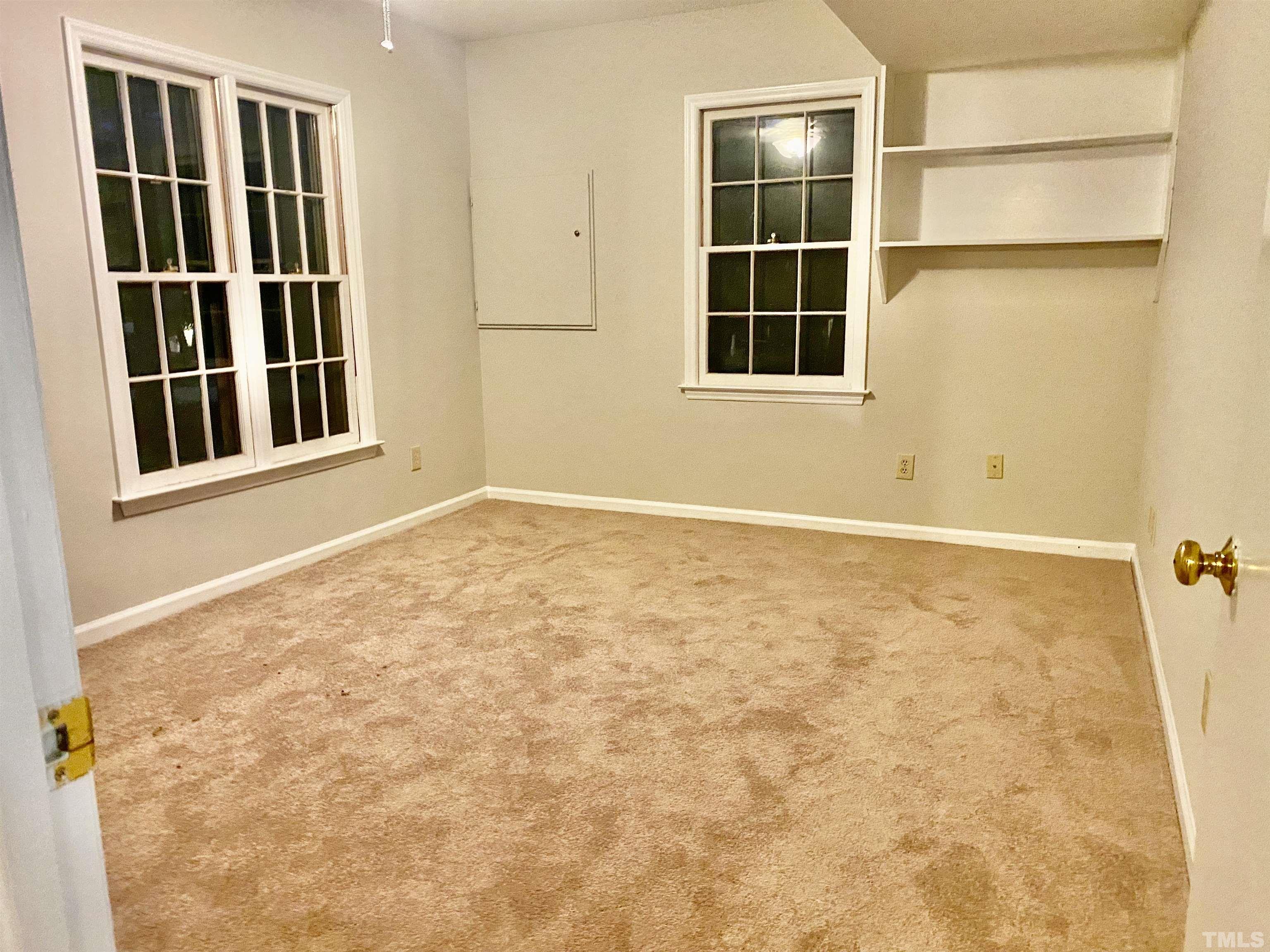 6929 Three Bridges Circle Raleigh, NC 27613 - Photo 8 of 28 an empty room with windows
