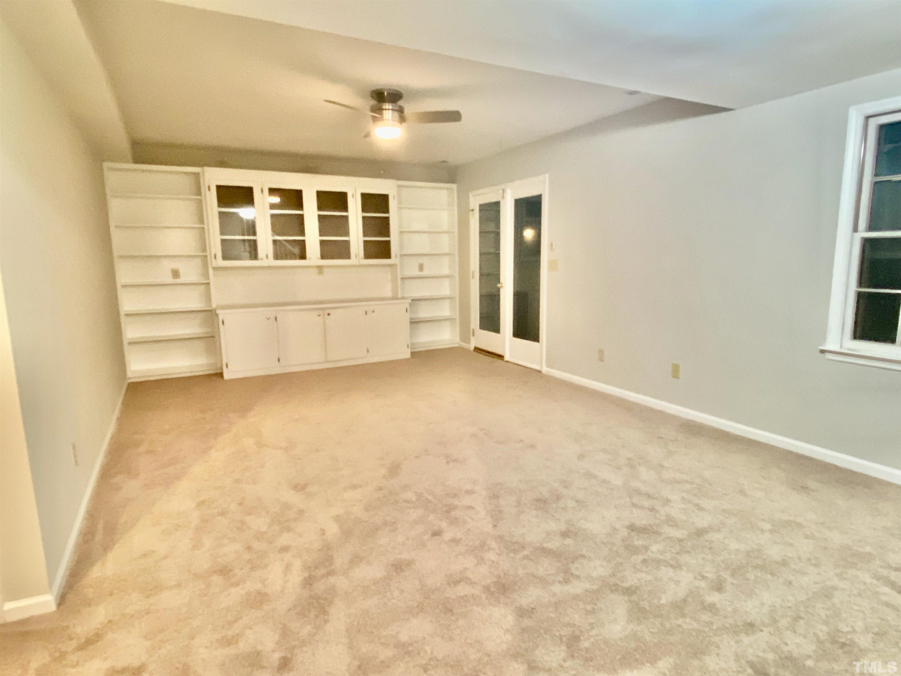 6929 Three Bridges Circle Raleigh, NC 27613 - Photo 9 of 28 an empty room with windows
