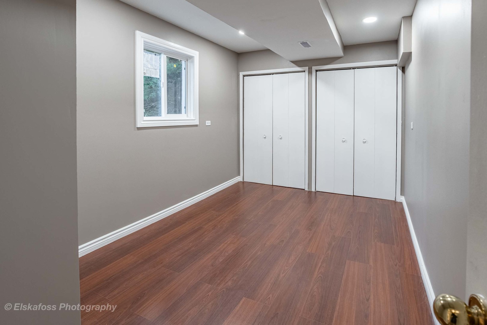 6329 Beaver Dam Road Matteson, IL 60443 - Photo 12 of 21 a view of an empty room with wooden floor and a window