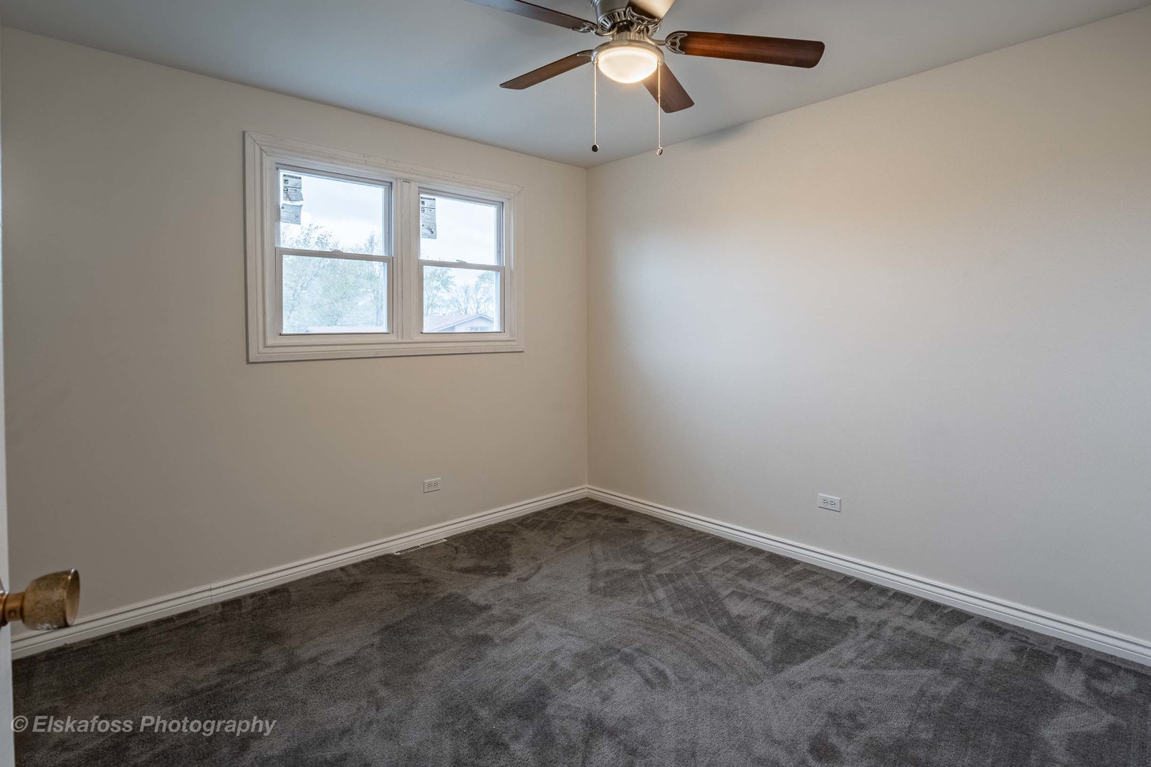 6329 Beaver Dam Road Matteson, IL 60443 - Photo 7 of 21 an empty room with a window and a fan