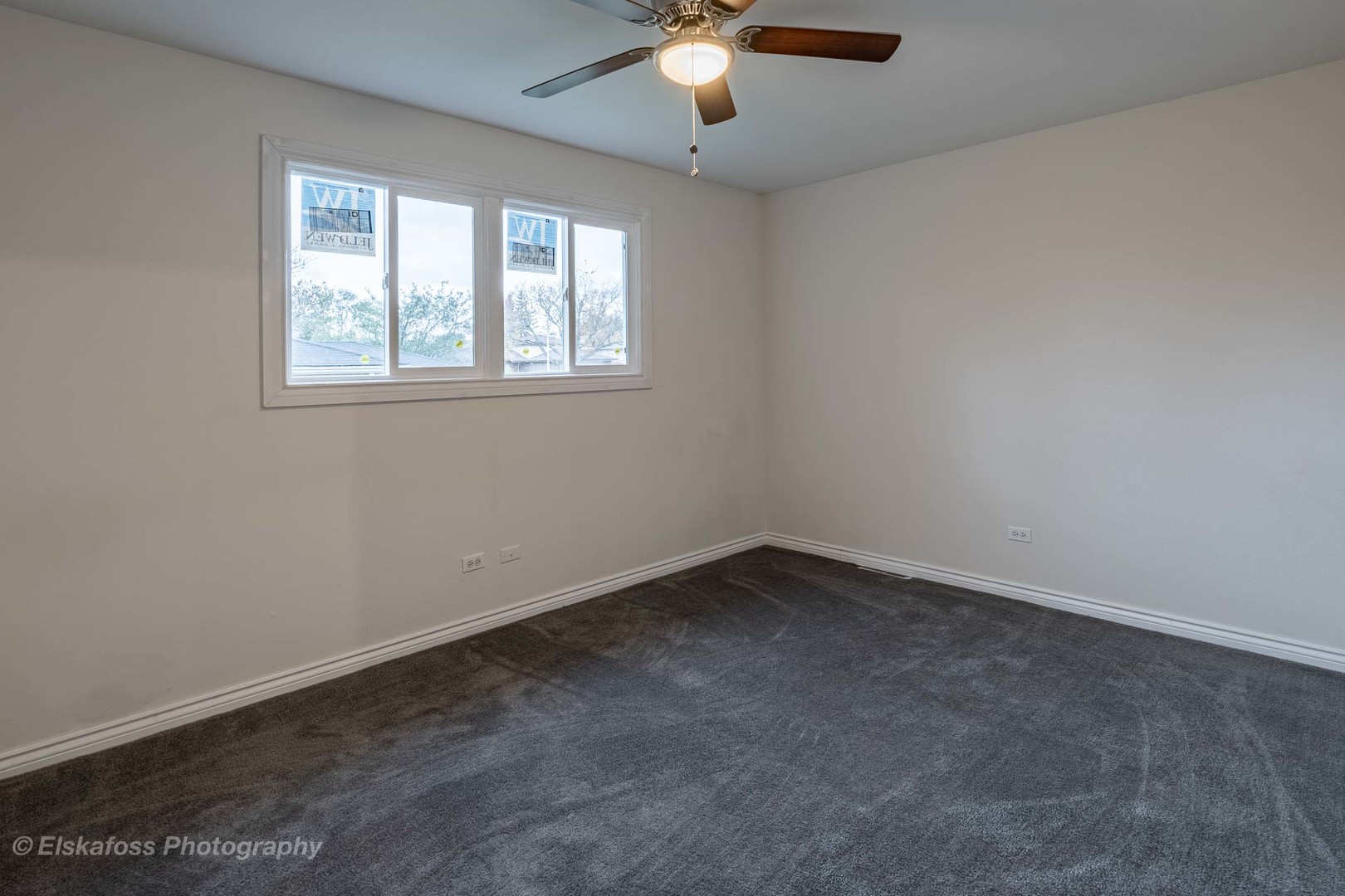 6329 Beaver Dam Road Matteson, IL 60443 - Photo 8 of 21 an empty room with a window and a fan