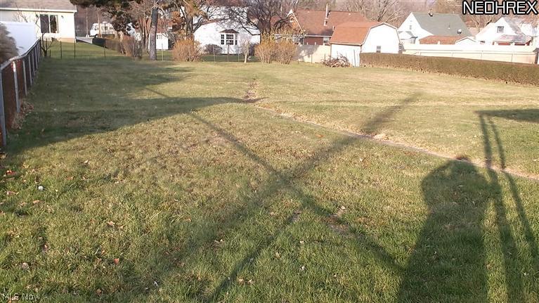 4335 7th Street Northwest Canton, OH 44708 - Photo 3 of 21 The back yard is very deep and partially fenced and hedge lined