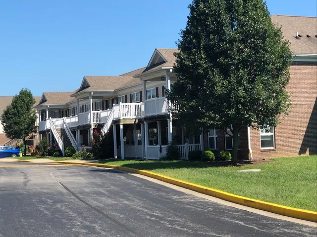 a view of large building with a yard