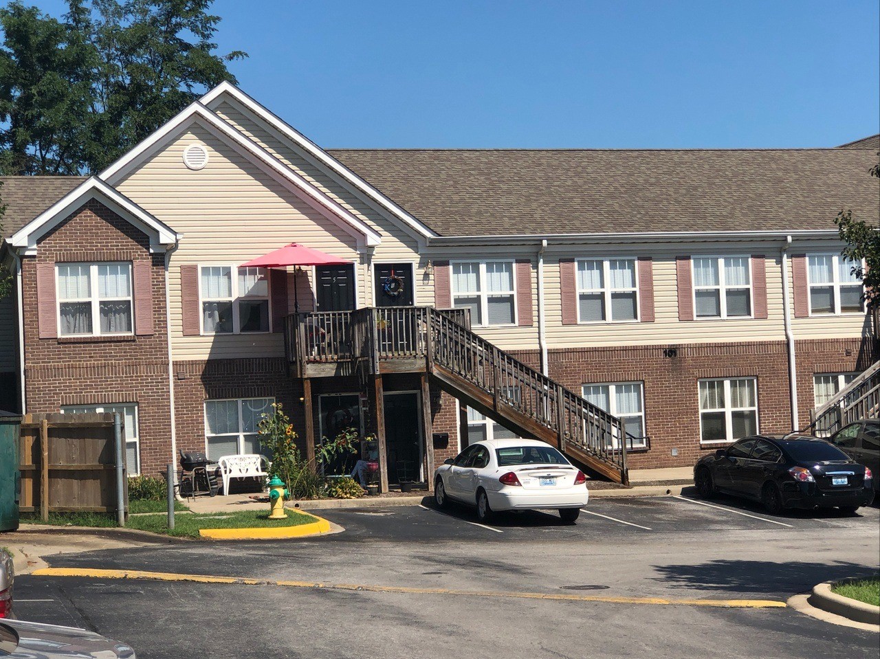 101 Overview Path Georgetown, KY 40324 - Photo 6 of 6 a view of a brick house with many windows and yard