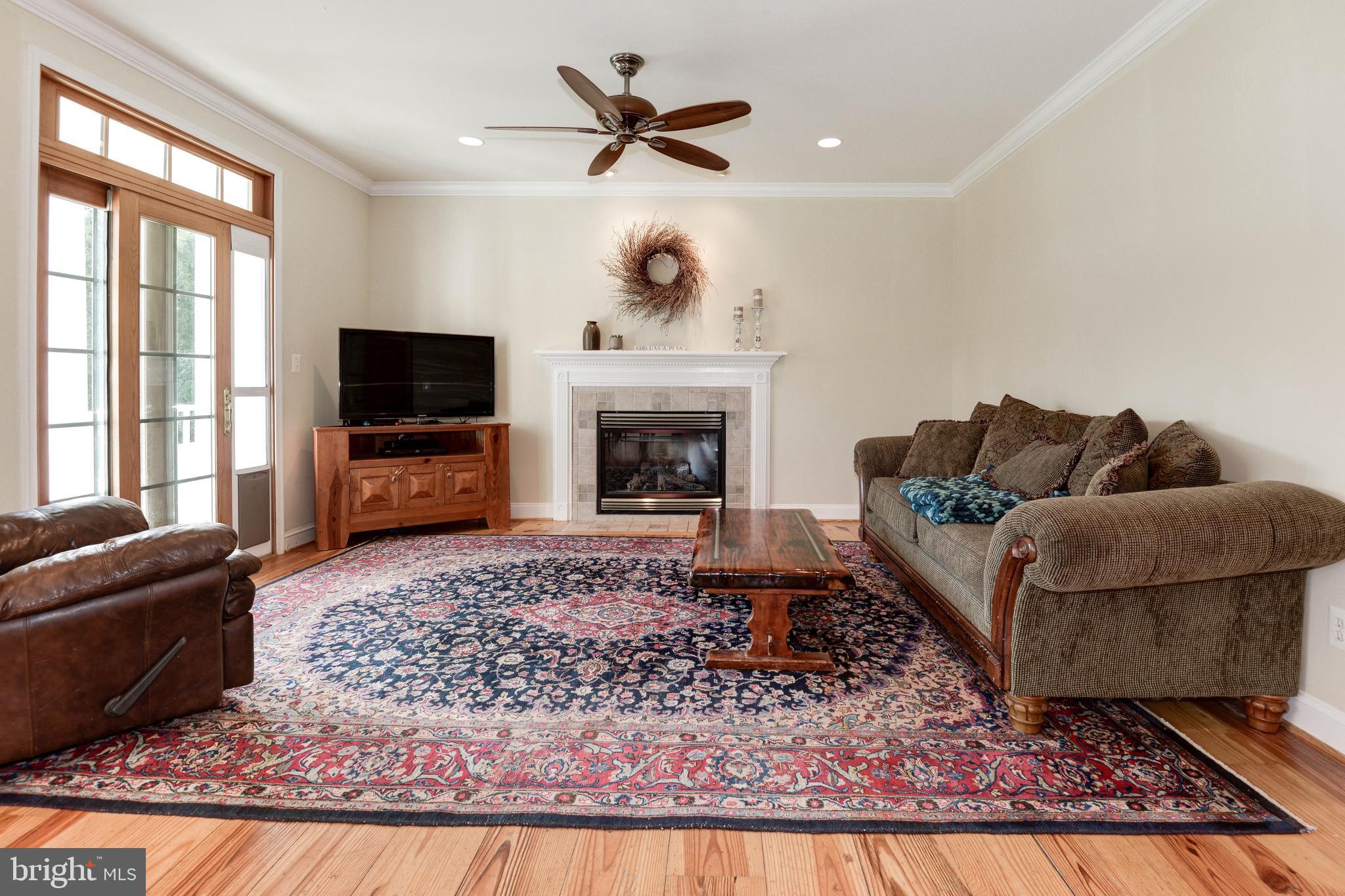 36906 North Fork Road Purcellville, VA 20132 - Photo 16 of 57 Main Level Family Room with Gas Fireplace