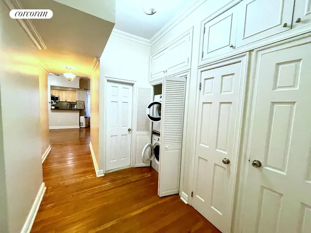wooden floor in an empty room with a fireplace