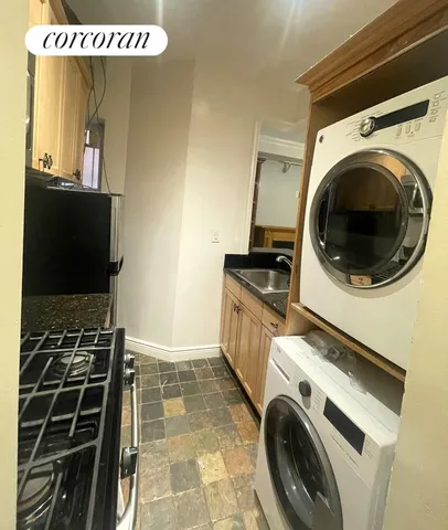 a bedroom with a bed and windows