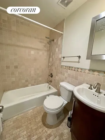 a view of a livingroom with furniture and a fireplace