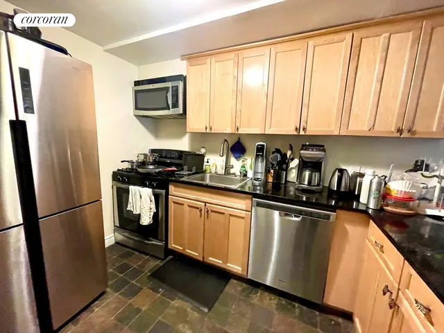 a picture of a bathroom with a shower