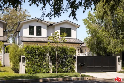 a front view of a house with an empty space